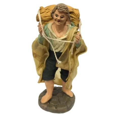 Uomo con legna in terracotta con vestiti di stoffa 12 cm