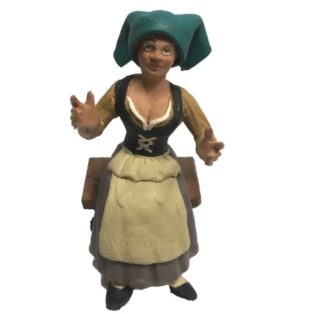 Donna seduta in terracotta 12 cm