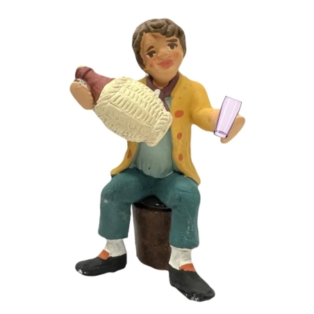 Uomoi seduto che beve vino in terracotta 10 cm