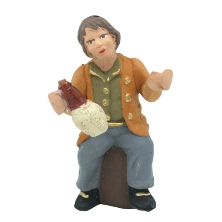 Uomo seduto che beve vino in terracotta 7 cm