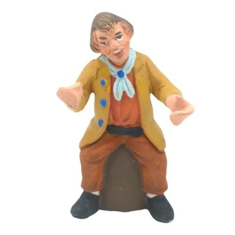 Uomo seduto in terracotta 7 cm
