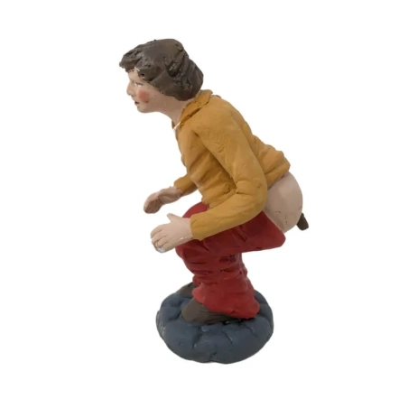 Pastore che fa la cacca in terracotta 10 cm