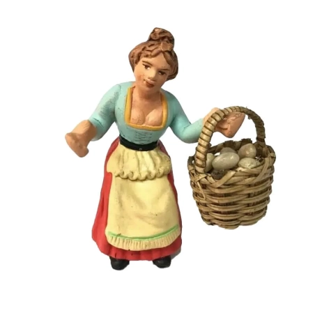 Donna con cesto di uova in terracotta 10 cm