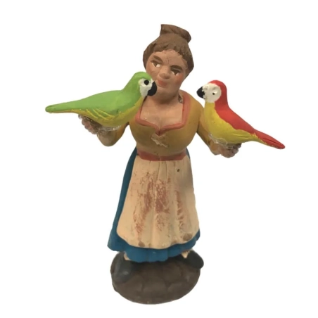 Donna con pappagallo in terracotta 10 cm